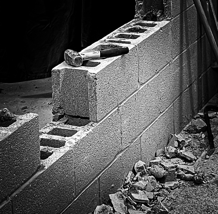 A block wall being taken down